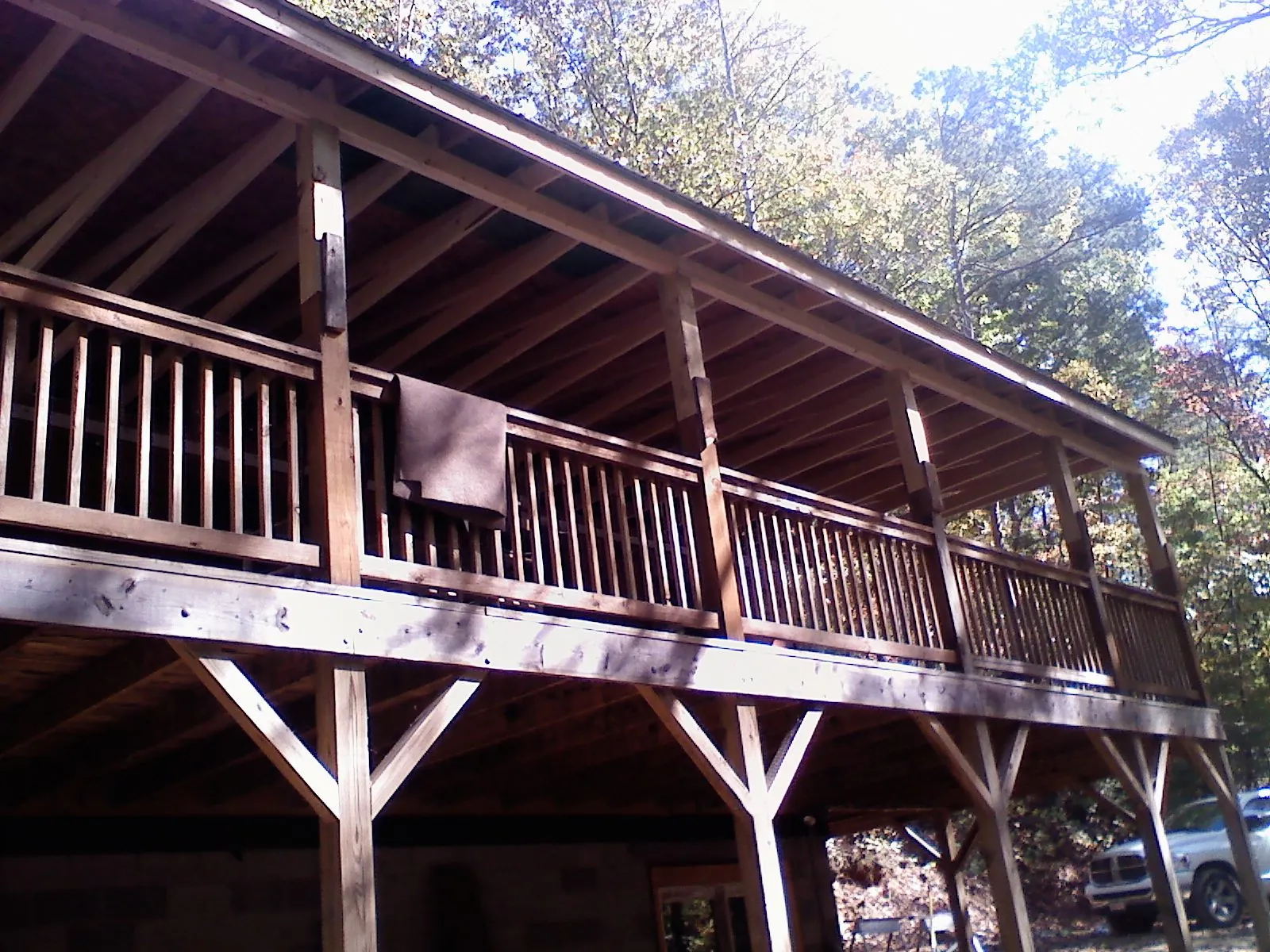 Timber framing under a new elevated porch and deck — Roof Leak Repair in Southlake by Roofing Brothers